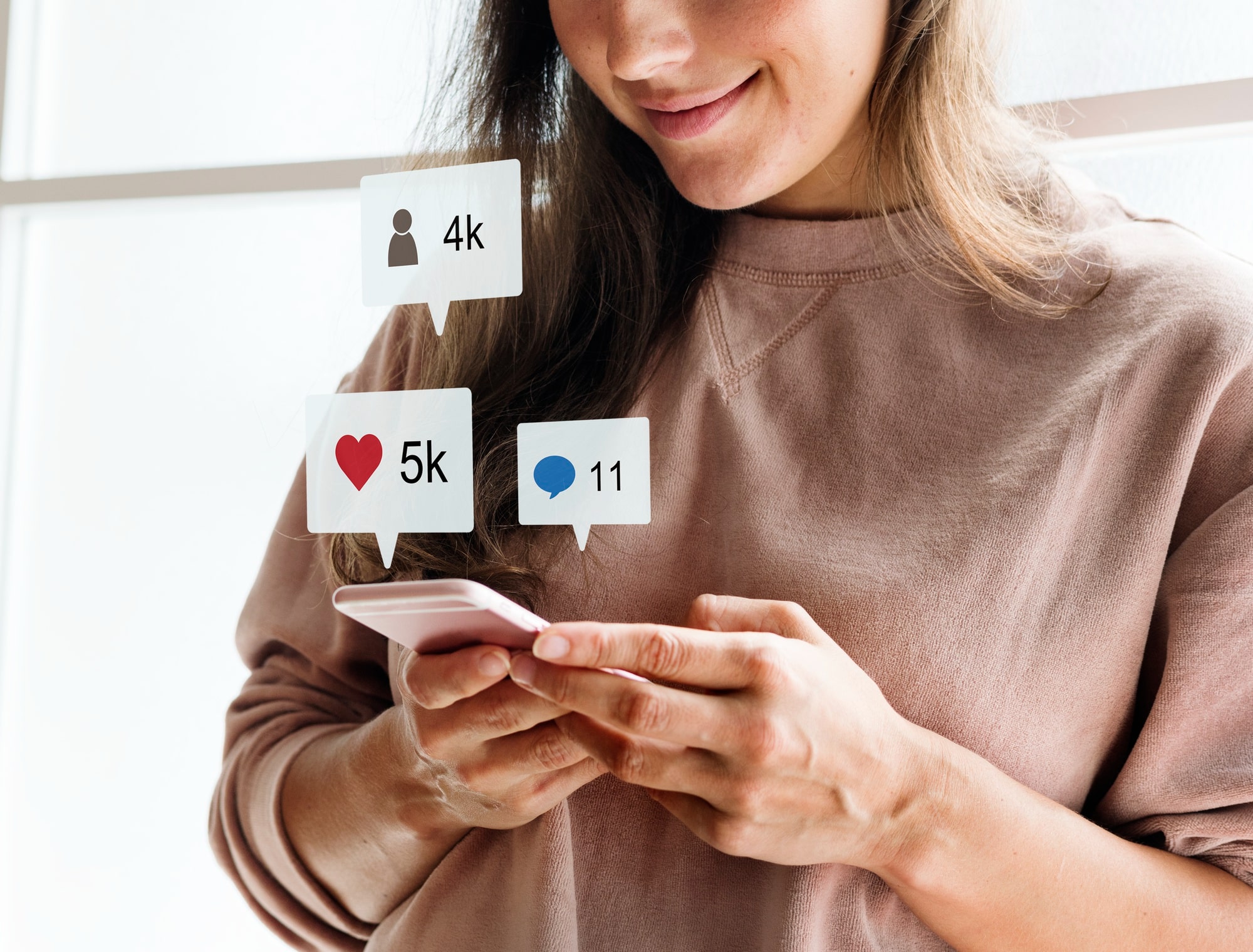 woman-using-smartphone-social-media-conecpt-min